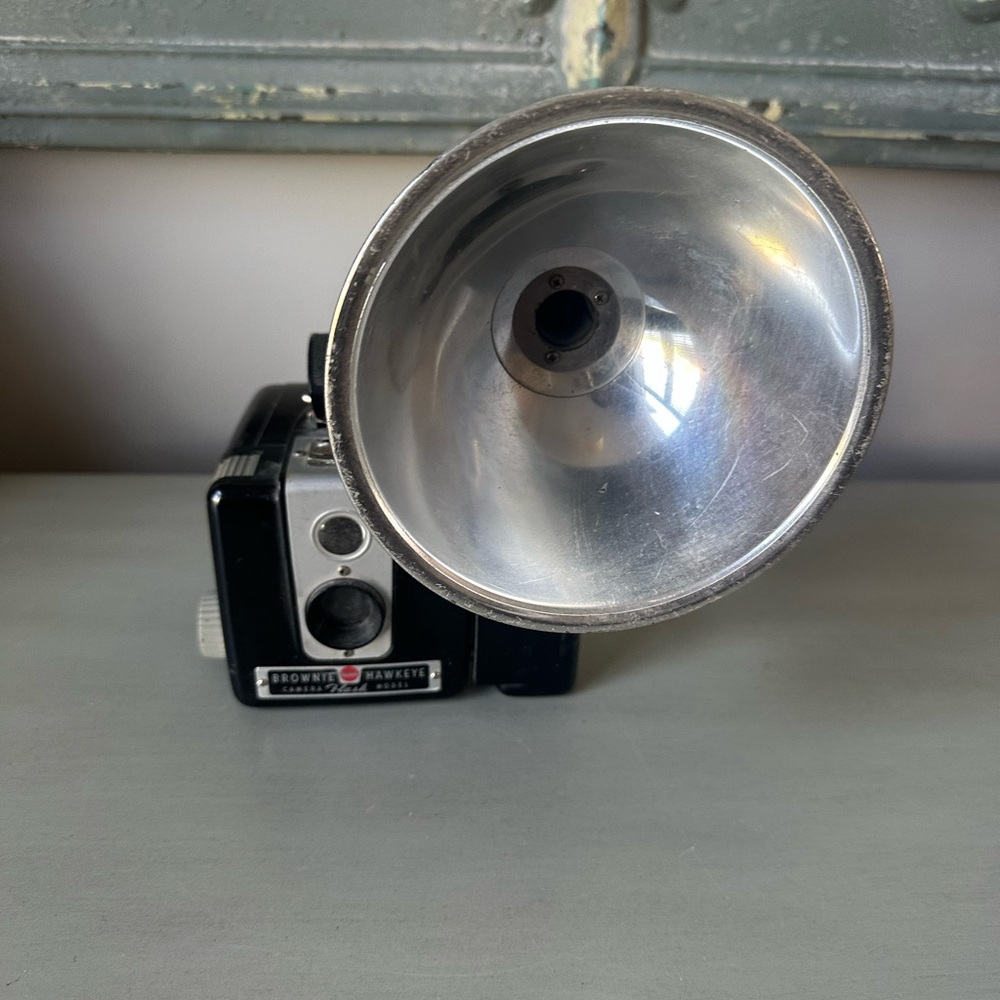 Vintage brownie Hawkeye camera and flash